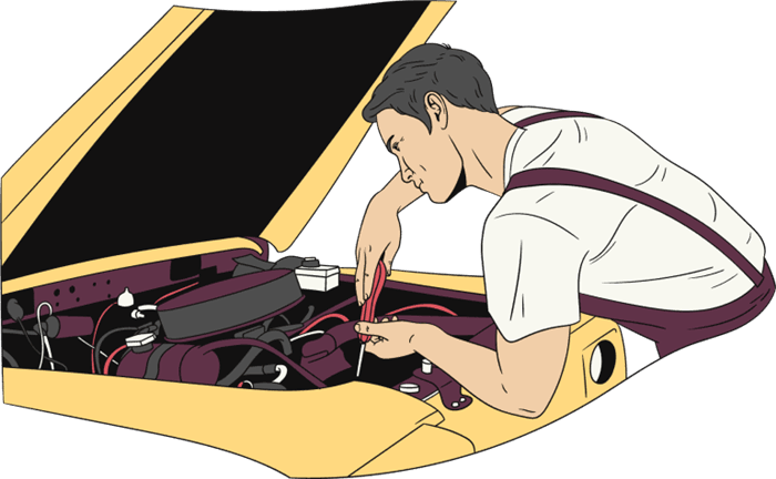 Ein Mann, der ein Auto repariert